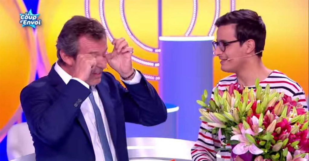 jean-luc-reichmann-surprise-paul-anniversaire-fleur